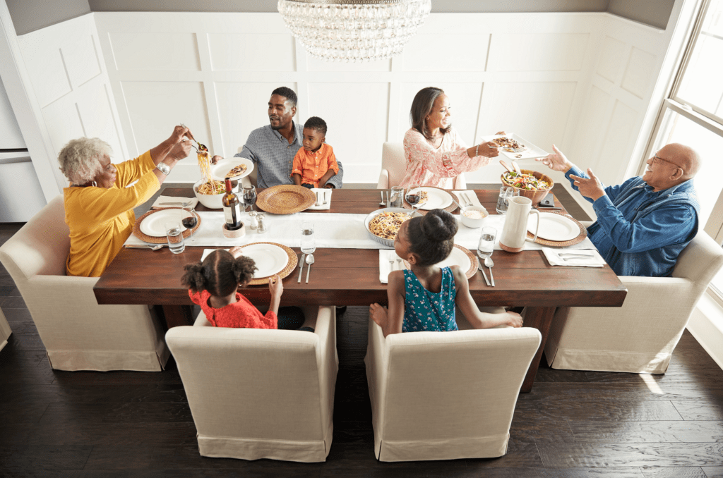 Family having breakfast at the dining table | TUF Flooring LLC