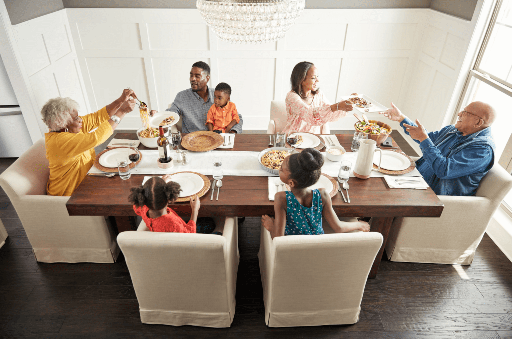 Happy family enjoying break fast | TUF Flooring LLC